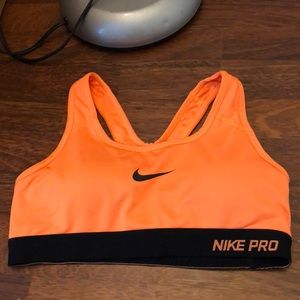 neon orange Nike pro sports bra